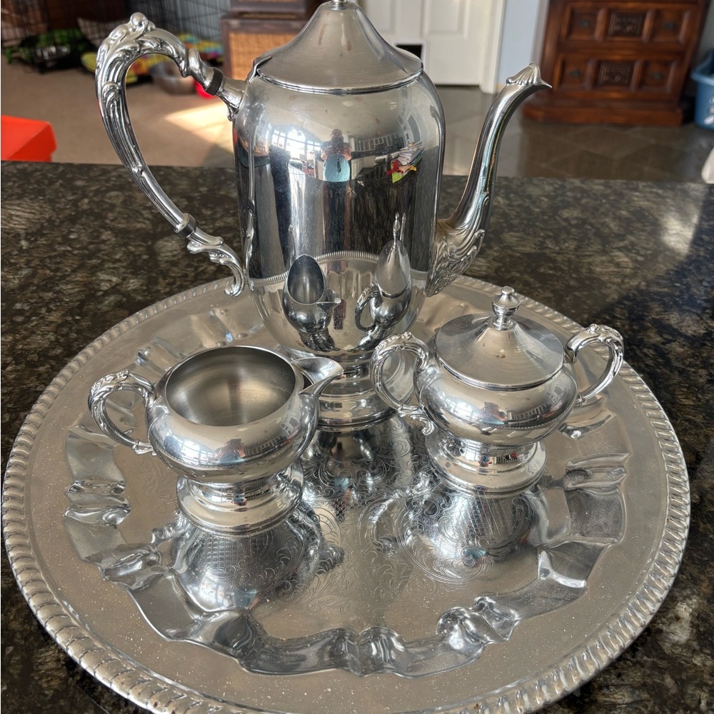 Elegant chrome Tea Set by Danny Wilson.